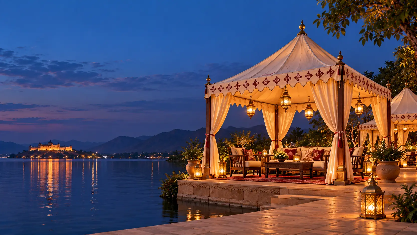An illuminated event tent beside the water in the evening. Illustrated setting, not a completed Casa Marwad project.
